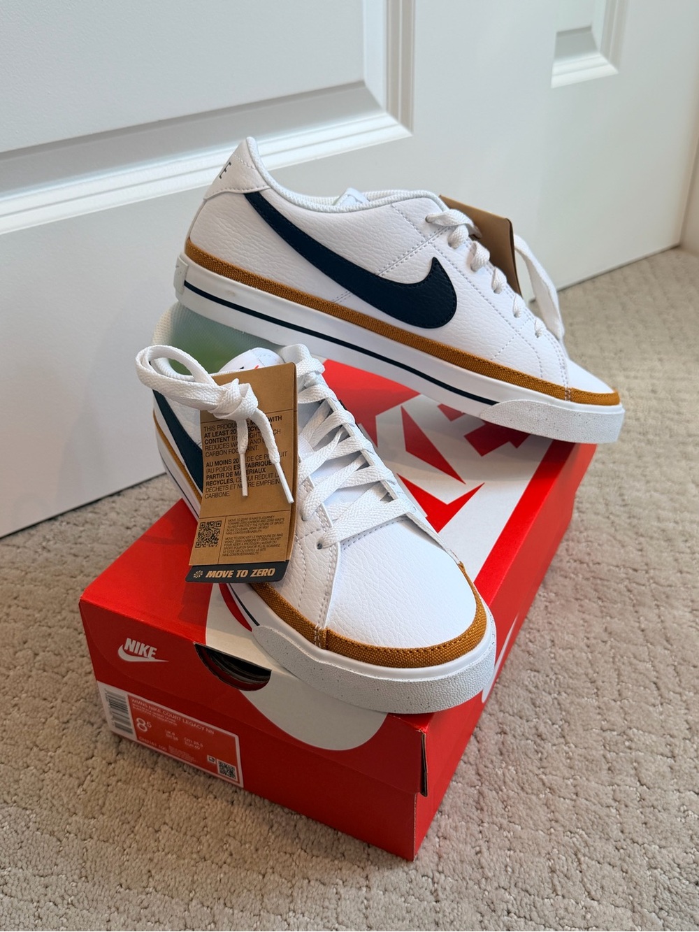 Nike Men’s White Sneakers with Black Swoosh and Brown Trim